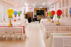 Wide-angle view of Abyss Hall showcasing its spacious layout, colorful balloon décor, and modern seating—perfect for kids birthdays, family gatherings, and vibrant celebrations.